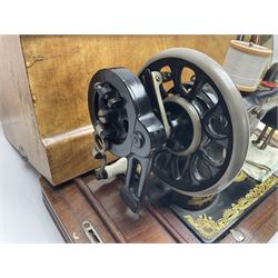 Cased sewing machine, together with bed warmer and copper hunting horn