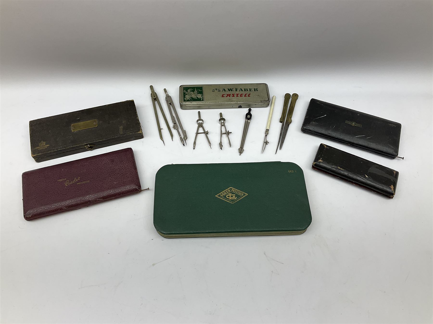 Negretti & Zambra drawing instrument set, the ruler with manuscript name 'F/Sgt. F. Hamilton R.A.F. 194(?)', cased; four other drawing instrument sets by Anker-Precision Germany, EcoBra, Temple etc, all cased; and quantity of loose drawing instruments