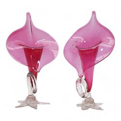 Early 20th century Bohemian cranberry glass flower form plate, overlaid with opaque and hand painted and gilded with a floral bouquet, D19.5cm, pair of cranberry glass pulpit vases, satin glass ewer and two further pieces of cranberry glass (6)