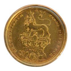 George IV 1825 silver one shilling coin, gilded, in glazed 9ct gold surround