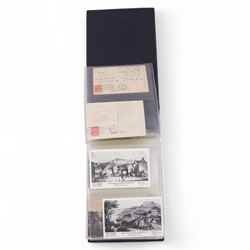 Collection of Scarborough postcards, mostly black and white examples, in postcard album