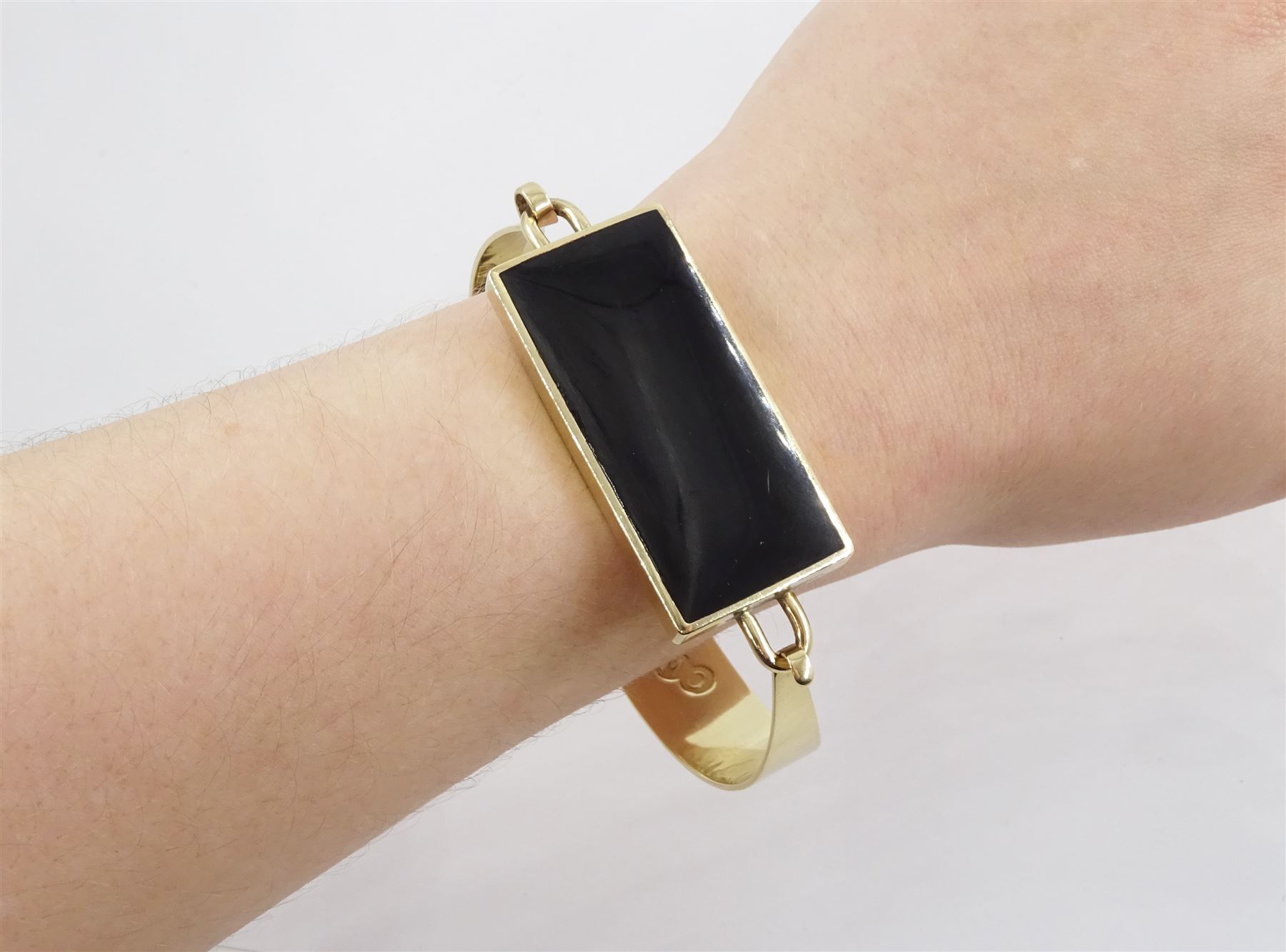 9ct gold rectangular Whitby jet, wide bangle by C W Sellors, Sheffield 1996