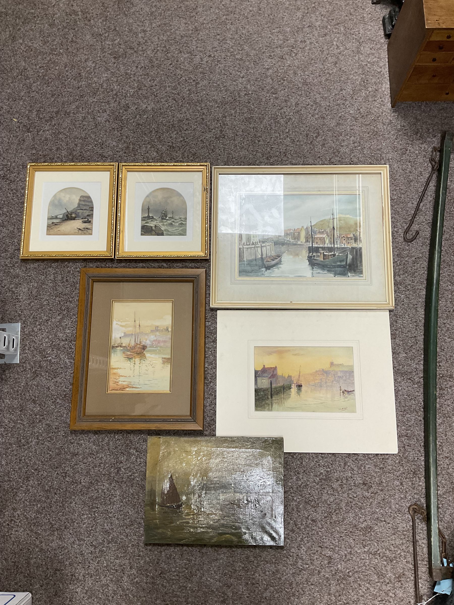 Collection of Whitby themed pictures, to include John Francis Branegan (British 1843-1909): Stormy Seas and Beached Sailboat, pair of watercolours; E Heslewood (British 20th century): Sailboats off Whitby Lighthouse, oil on canvas and Thomas Clavering Alder (British 1857-1931): Whitby at Sunset, watercolour, variously signed titled and framed max 25cm x 35cm (17)