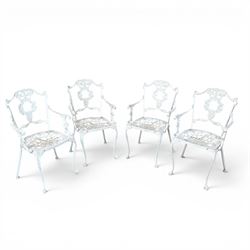 Victorian design cast aluminium circular garden table and four armchairs, ornate grape design in antique white paint