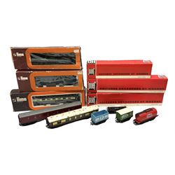 '00' gauge - three Jouef passenger coaches; three Lima passenger coaches; all boxed; Trix Twin Pullman coach; Tri-ang coach; and four goods wagons (12)