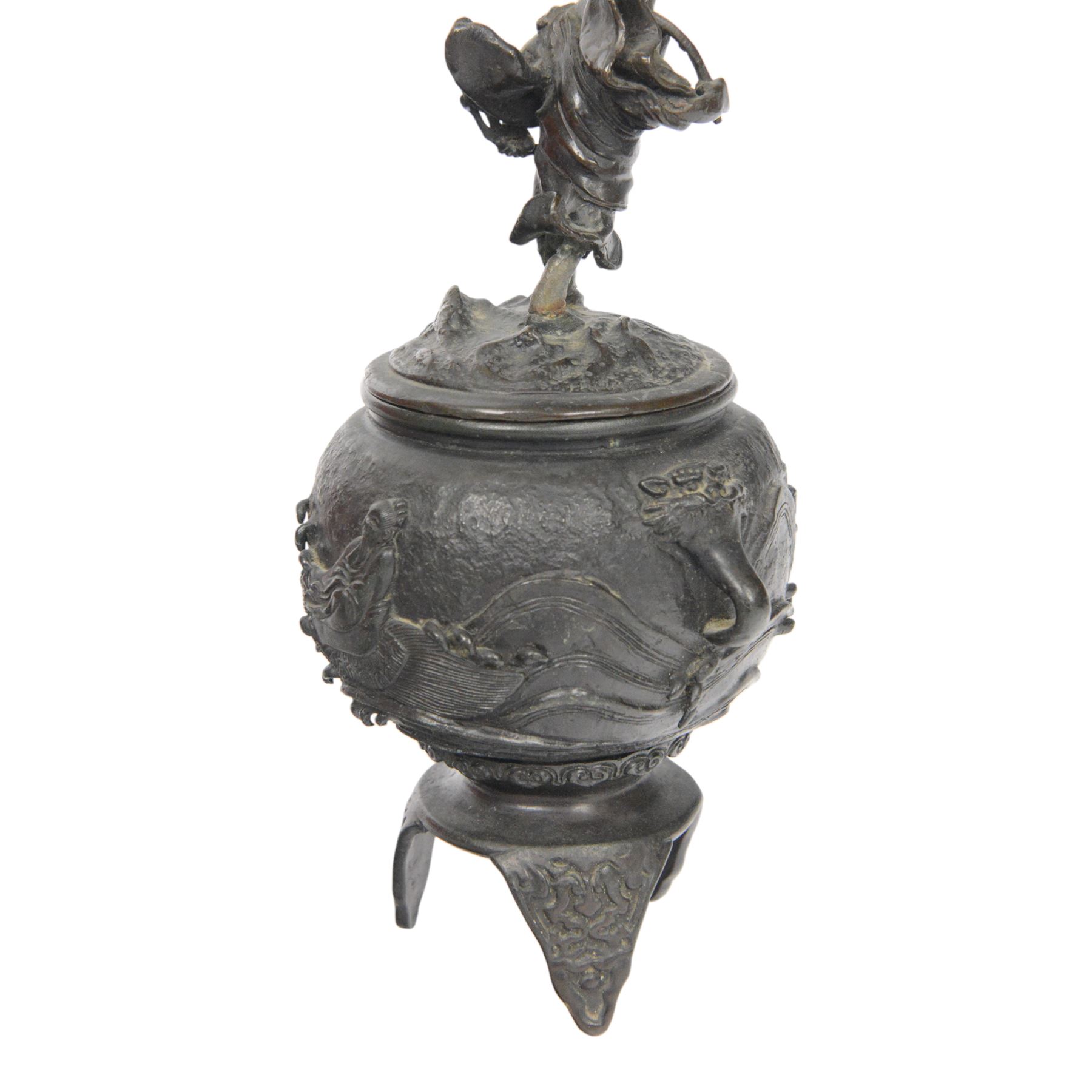 Pair of Japanese bronze koro, raised upon three feet, he body of the koro decorated with figures and animals, the cover mounted with figures, H24cm