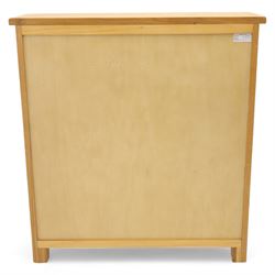 Modern oak effect shoe cabinet, plain rectangular top over two fall-front drawers with metal drop handles, framed sides and block supports