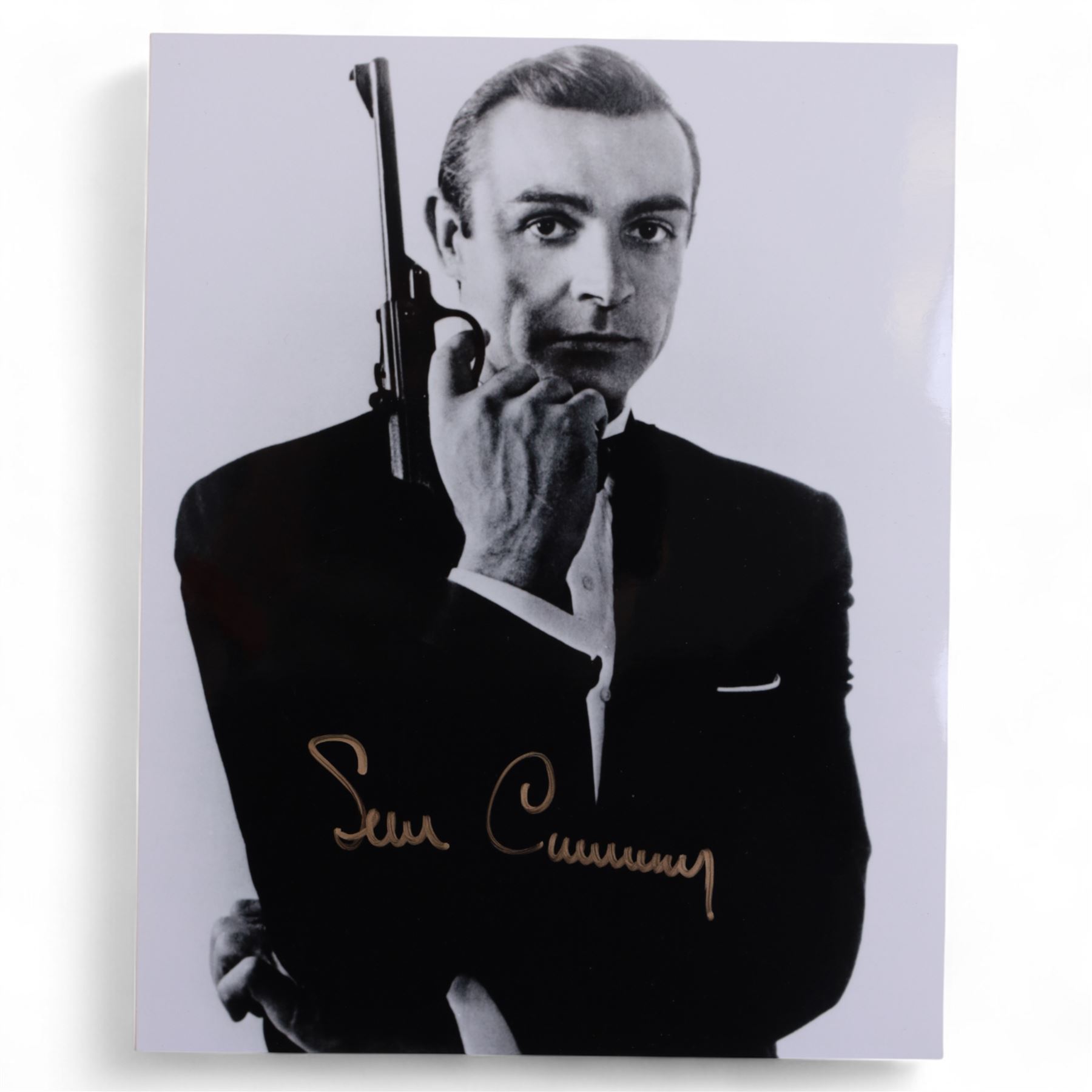 Collection of James Bond related signed film stills and promotional photographs, including Sean Connery and Pierce Brosnan promotional shots, Desmond Llewelyn, Octopussy poster, John Glenn, Blanche Ravalel, Geoffrey Holder and Julian Glover, all with certificates of authenticity