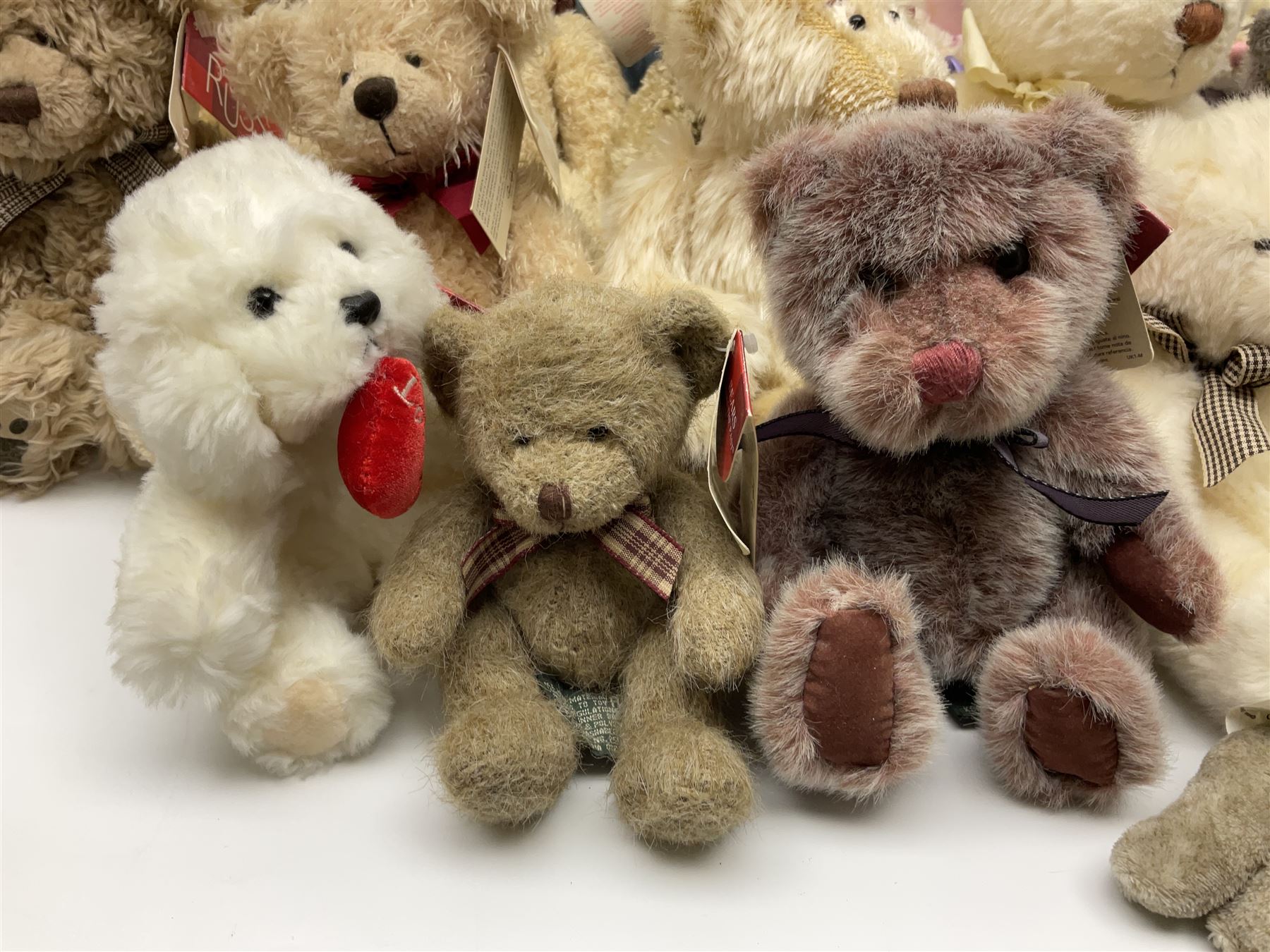 Eighteen Russ teddy bears including Ariella, Chloe, Spencer and Desmond,  mostly with tags, together with six other soft toys, tallest H42cm (24)