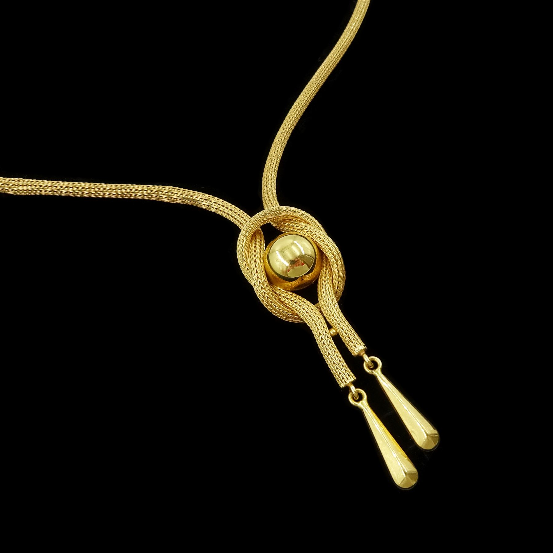 18ct gold mesh link necklace, with a knot and circular design pendant, stamped 750