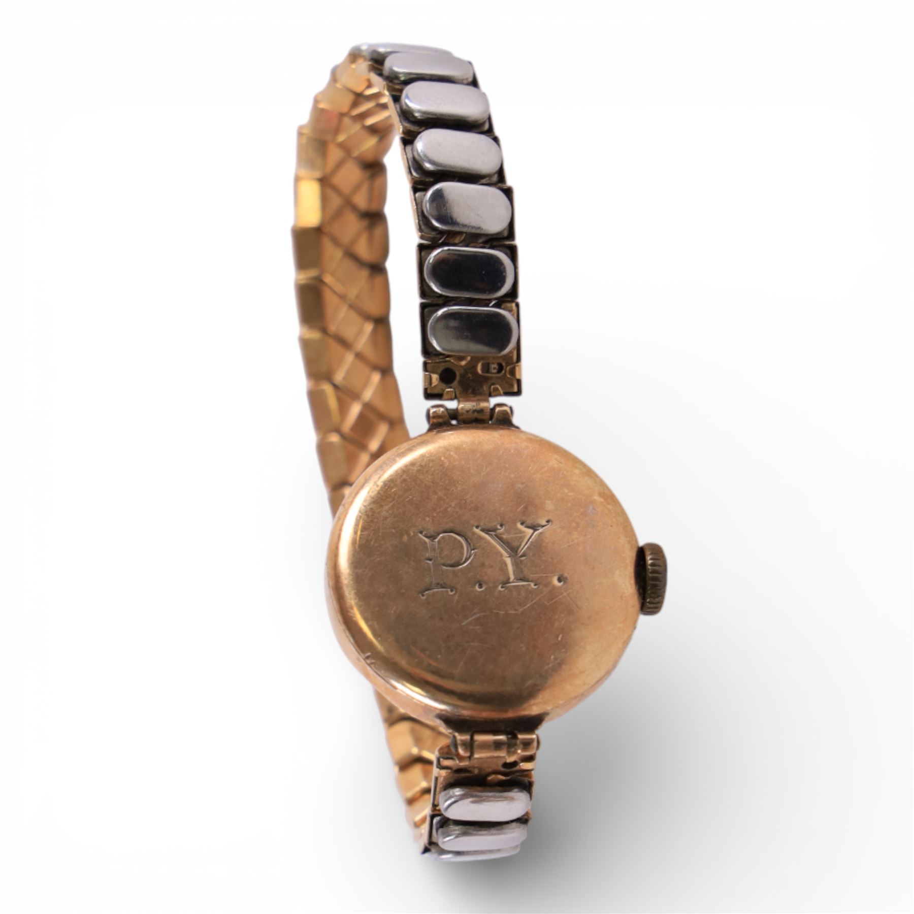 9ct gold wristwatches and parts, comprising ladies watch with 9ct gold case and integral strap, ladies 9ct gold wristwatch on 9ct gold expanding strap, 9ct gold cased miniature compass, and a ladies wristwatch with 9ct gold back case on a gilt strap