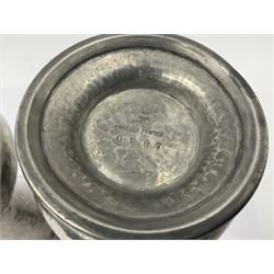 Pair of Liberty & Co Tudric pewter vases, each of bellied form with hammered finish, upon a circular spreading foot, impressed beneath 0987, H12cm