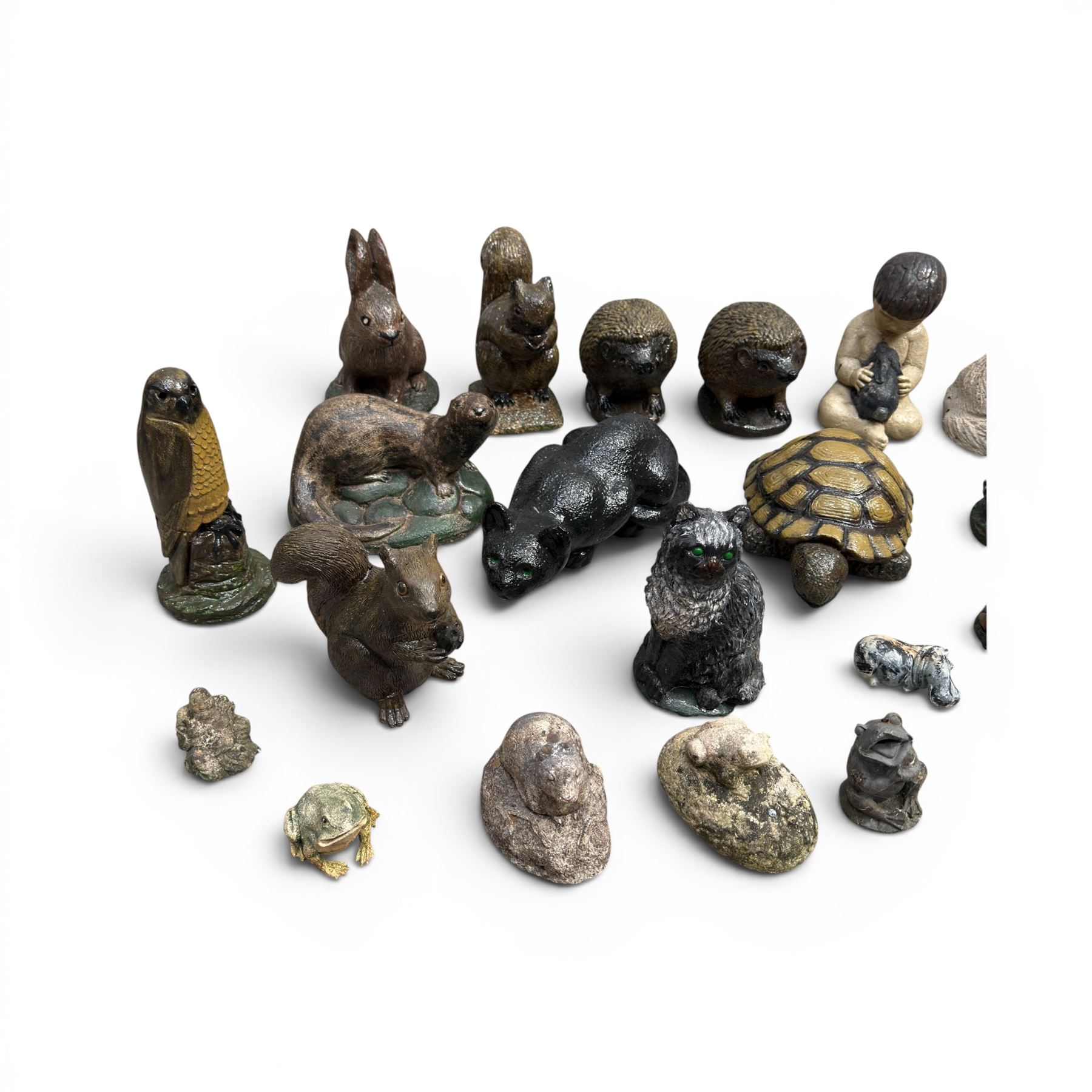 Collection of 33 small glazed cast stone garden animals and figures