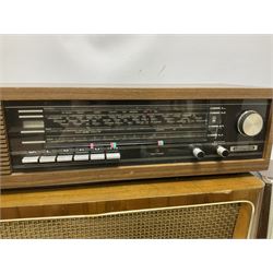Three mid 20th century radios comprising 1950s Grundig wood cased valve radio model 3028/GB, together with a 1970s Grundig Type RF 153 CS 150 radio in teak case, and an Ekco 355 1960's valve radio, largest W60 H35cm D23cm