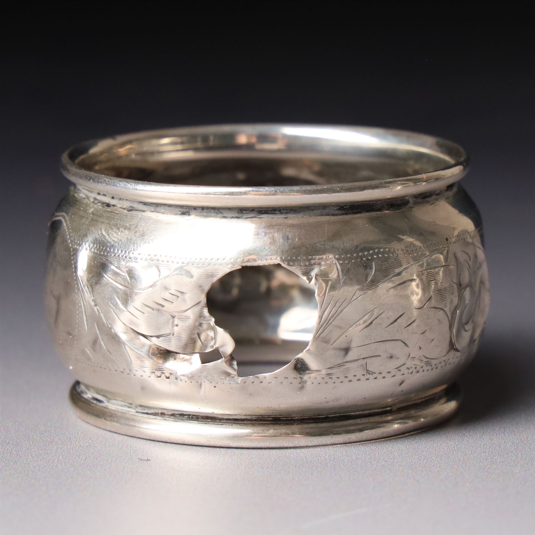 Pair of late Victorian silver napkin rings with engraved decoration Birmingham 1899 and seven other silver napkin rings