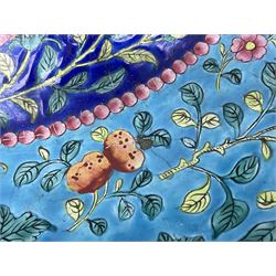 18th/19th century Chinese Canton enamel basin, the circular basin with flat everted rim, decorated with scrolling foliate and fruit decoration on a blue ground, D43cm
