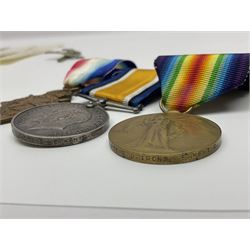 WWI group of three medals comprising 1914-15 Star, British War Medal and Victory Medal awarded to G-6435 Pte. R.J. Irons E. Kent R.; with Royal West Kent cap badge and manuscript regimental testimonial to L/C R. Gould R.W. Kent Regt.