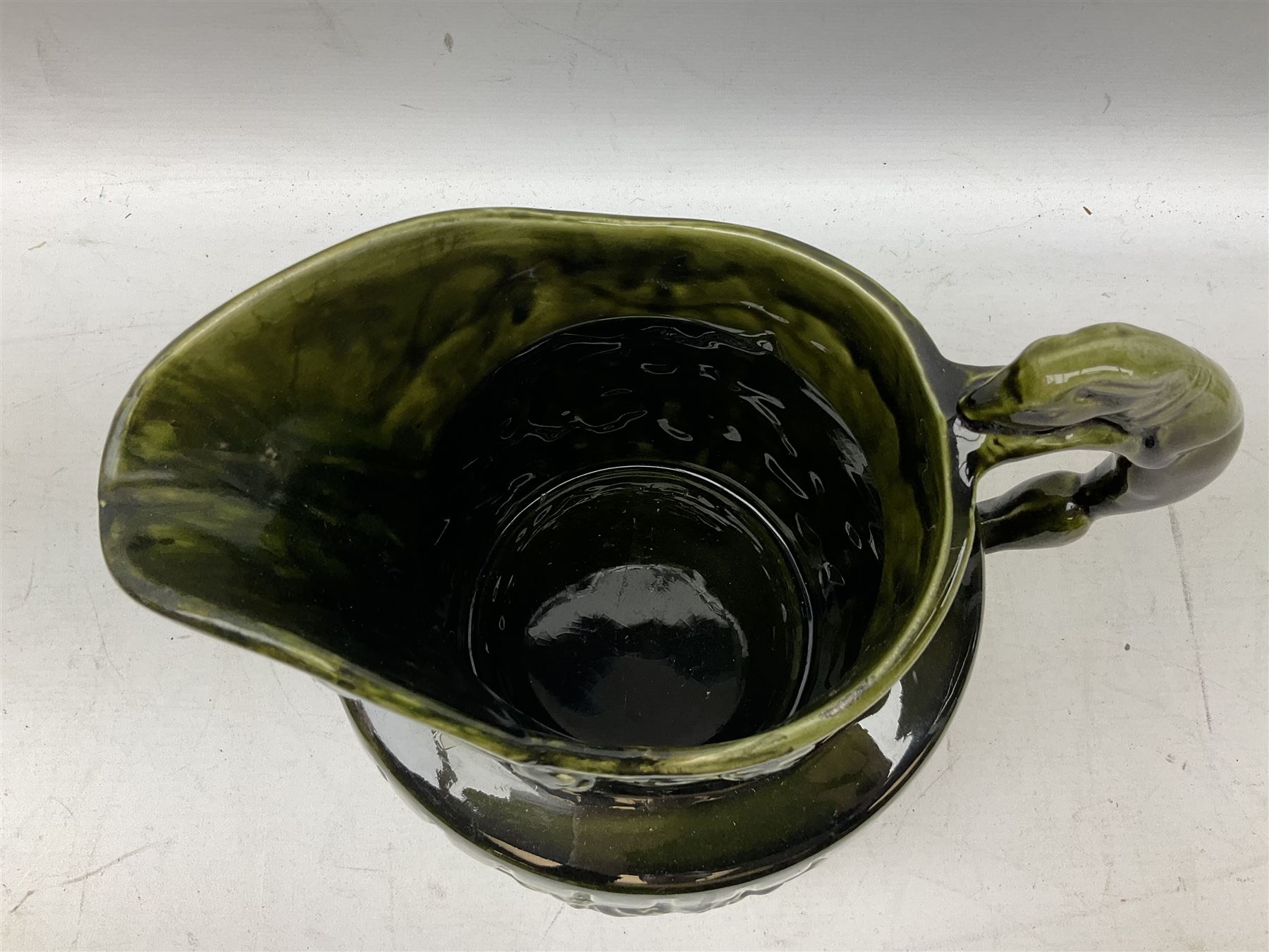 Three jardinières comprising West German Gerz example decorated in relief, Doulton Slaters example with frilled everted rim and a majolica example, and a further two Arthur Wood majolica jugs (5)