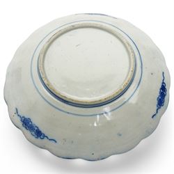 Japanese Imari charger decorated with panels of birds and flowers in orange, blue and red etc D37cm and two smaller Imari plates D21cm (3) 