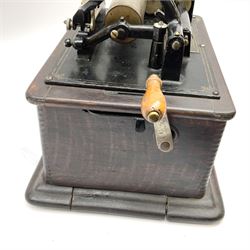 Edison Standard Phonograph with oak base (no cover), the reproducer marked 'Model C', serial no. 634857, last patent date Oct.1905, with black japanned conical horn L33cm; together with five cylinders