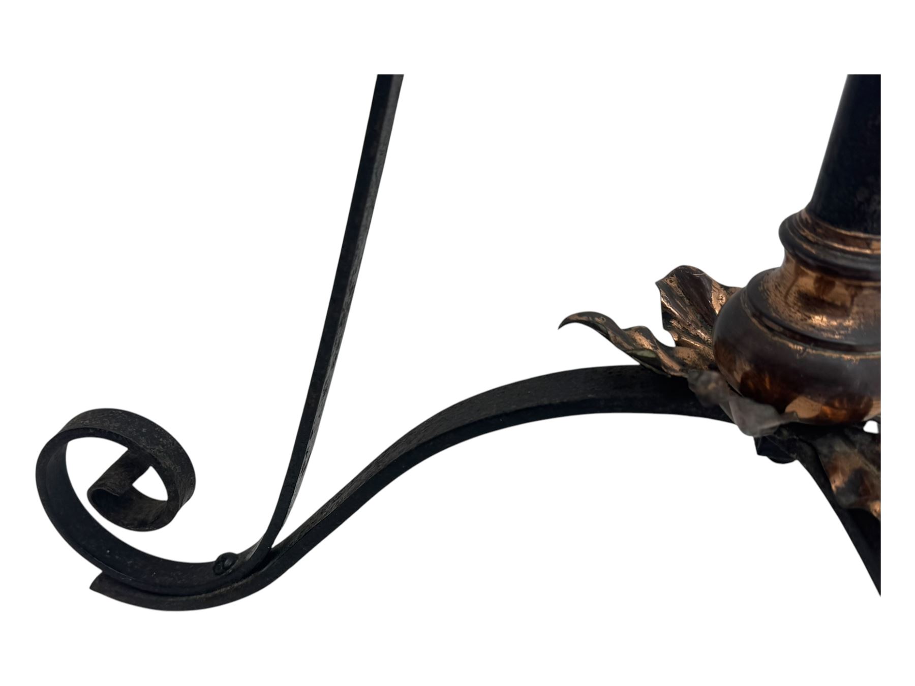 Late 19th century wrought iron and brass pulpit lamp, featuring an adjustable stem with a spiral twist detail, brass foliate mounts, and a tripod base with scrolled feet and decorative floral accents
