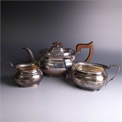 1930s three piece silver tea service, comprising teapot with wooden handle and finial, ope...
