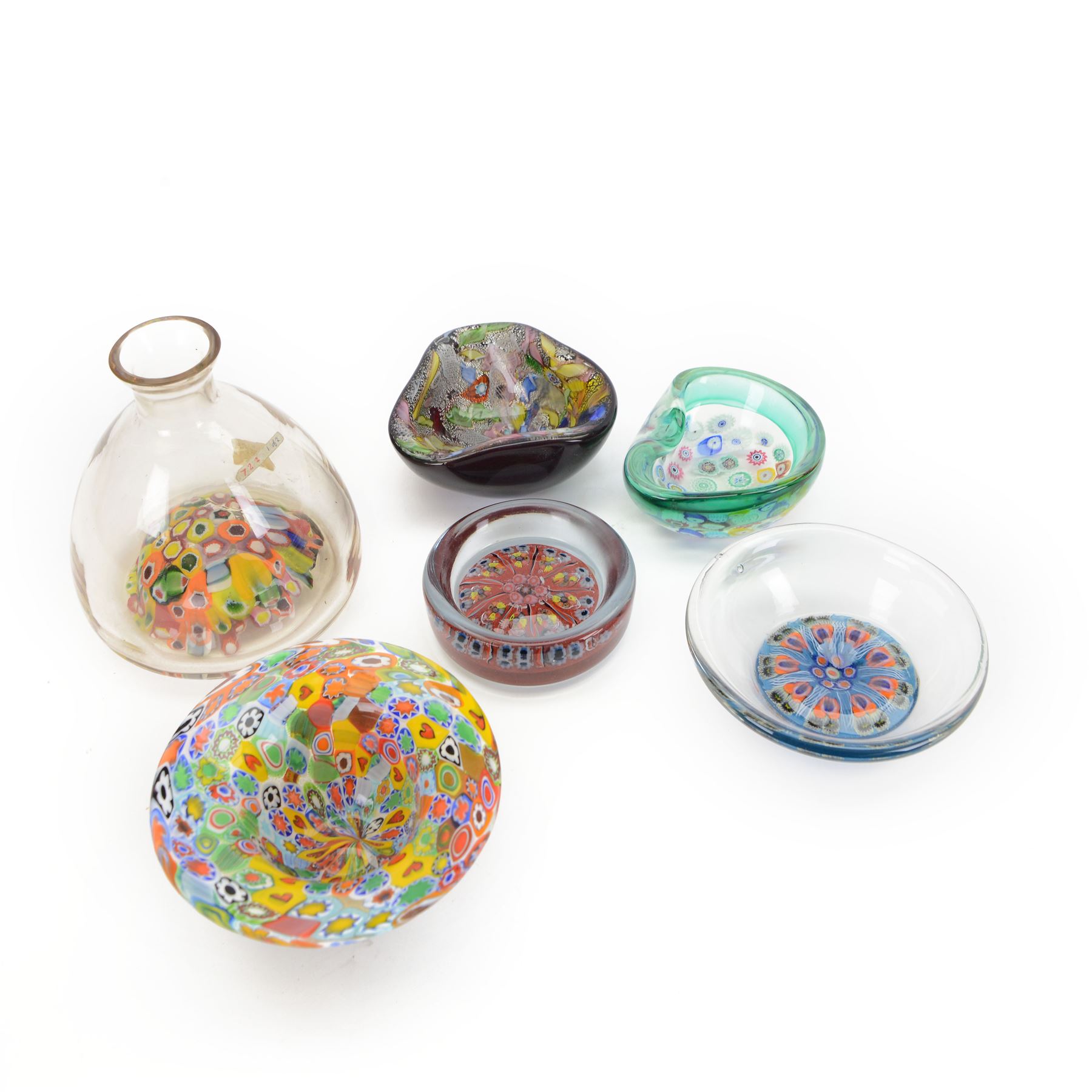 Millefiori glass bowl, upon a circular base, together with a glass bottle with millefiori base and four others 