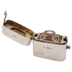 Edwardian silver travelling inkwell, of oblong form, the hinged cover with engraved monogram to top opening to reveal a gilt interior with cork section to underside of cover, and removable clear glass inkwell, hallmarked Percy Whitehouse, London 1903, H4.5cm W4.5cm, approximate gross weight (not including glass inkwell) 2.40 ozt (74.9 grams)