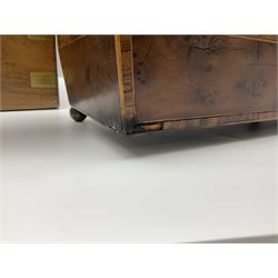 19th century burr yew wood tea caddy, of sarcophagus form, with strung details and brass mounts, the interior split into three compartments, upon four brass bun feet, together with an oak and brass bound writing slope, with red leather interior with gilt detailing, largest H16cm, W40cm