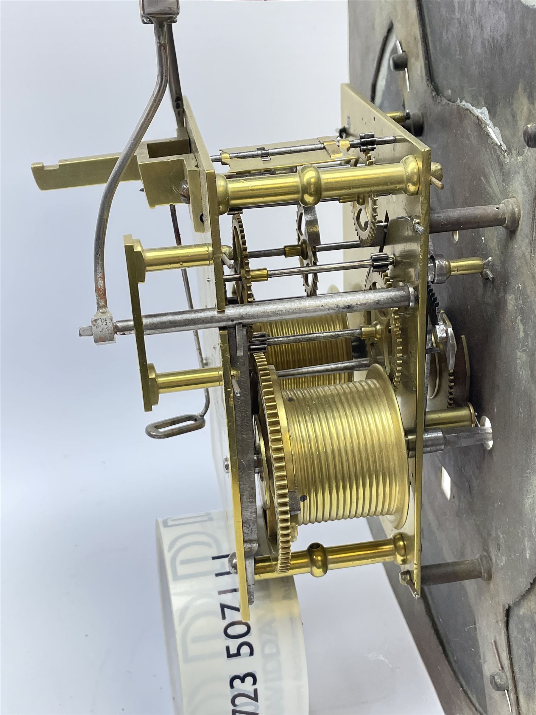 Late 18th century clock movement and dial, square brass dial with Arabic and Roman chapter ring signed 'Thos. (Thomas) Johnston, Dublin', with subsidiary seconds dial and calendar aperture, the dial set with ornate mask cast spandrels, twin train eight day movement striking on bell, with anchor escapement (34.5cm x 34.5cm, 13 1/2