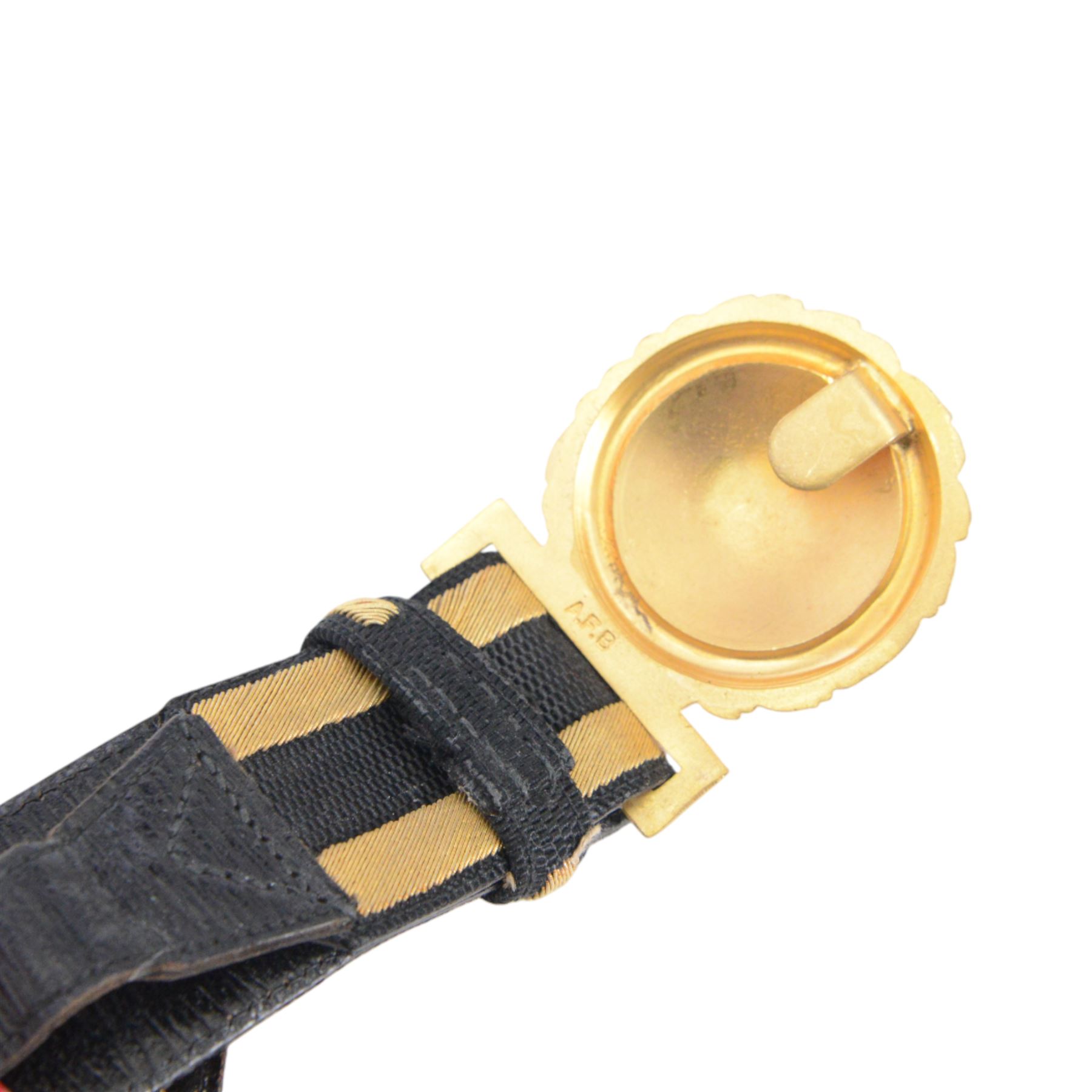 British 1827 pattern Naval officer's sword, named, by Wilkinson Sword Company in 1920 for P.H. Earle and retailed by Gives, the 80cm slightly curved blade etched to both sides, the brass guard held into scabbard by patent spring clip, lion head pommel and backstrap, with sword knot, within leather scabbard with three brass mounts, twin suspension rings and attached belt and suspension straps with gilt buckle and braid, overall L98cm 