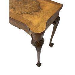 20th century figured walnut card table, shaped fold-over and cross-banded top, baize lined interior, on acanthus carved cabriole supports 