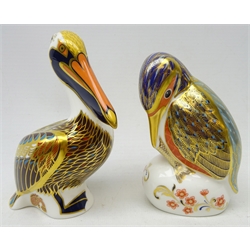  Two Royal Crown Derby paperweights, 'kingfisher' and 'brown pelican', boxed, with gold stoppers  