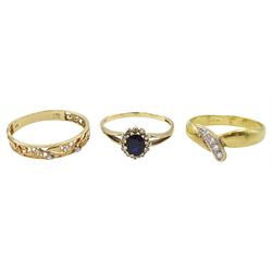 Gold diamond set openwork ring and a gold sapphire and diamond cluster ring, both hallmarked 9ct and an 18ct gold four stone cubic zirconia ring, stamped 750