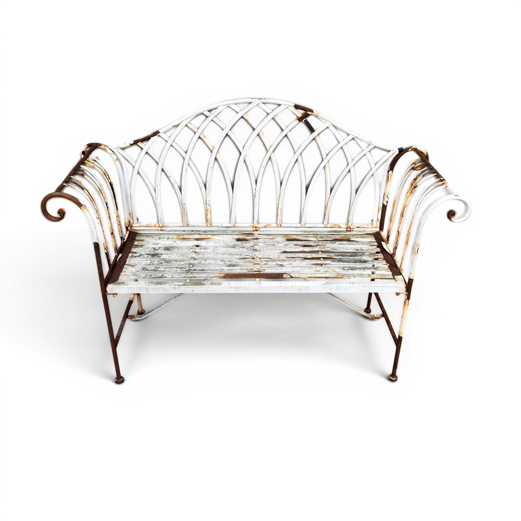 Small wrought metal two seat garden bench, finished in distressed white paint
