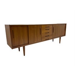 Nils Jonsson for Troeds - 'Gigant' mid-20th century teak sideboard, two double cupboards with sliding doors flanking five drawers, on tapering supports