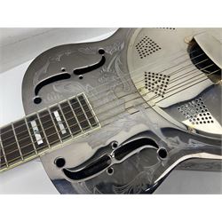 Ozark metal cased resonator guitar with all over chased foliate decoration to the polished finish and mother-of-pearl inlay to the fretboard L100cm; in Stagg hard carrying case