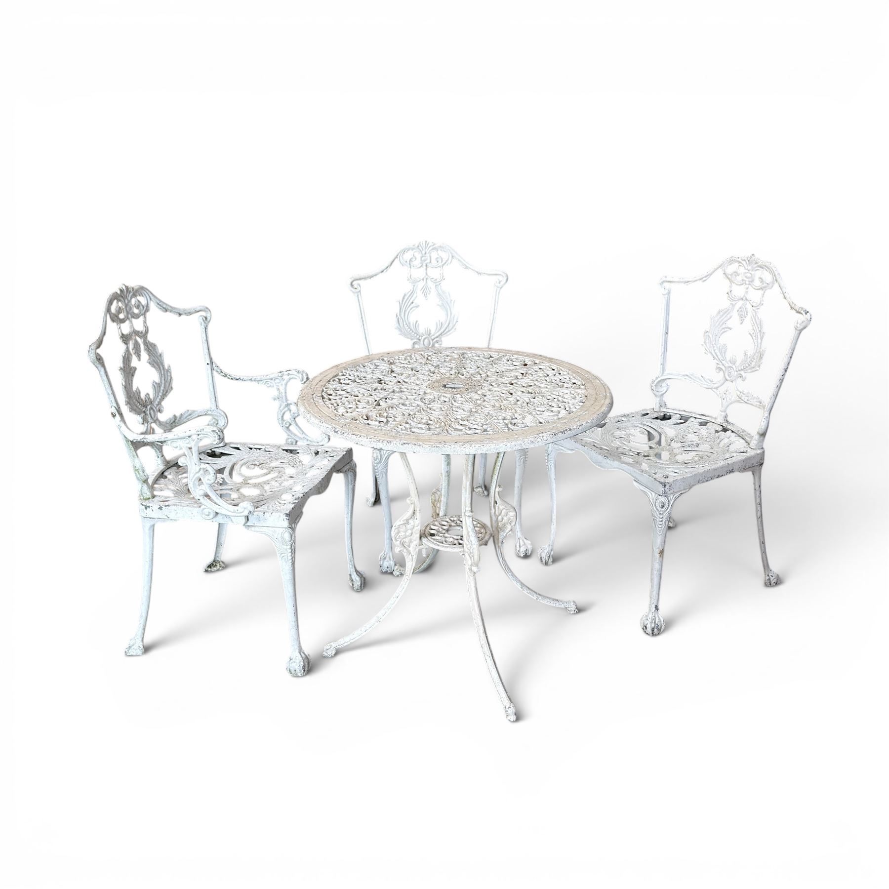 Victorian design cast aluminium circular garden table, and three chairs