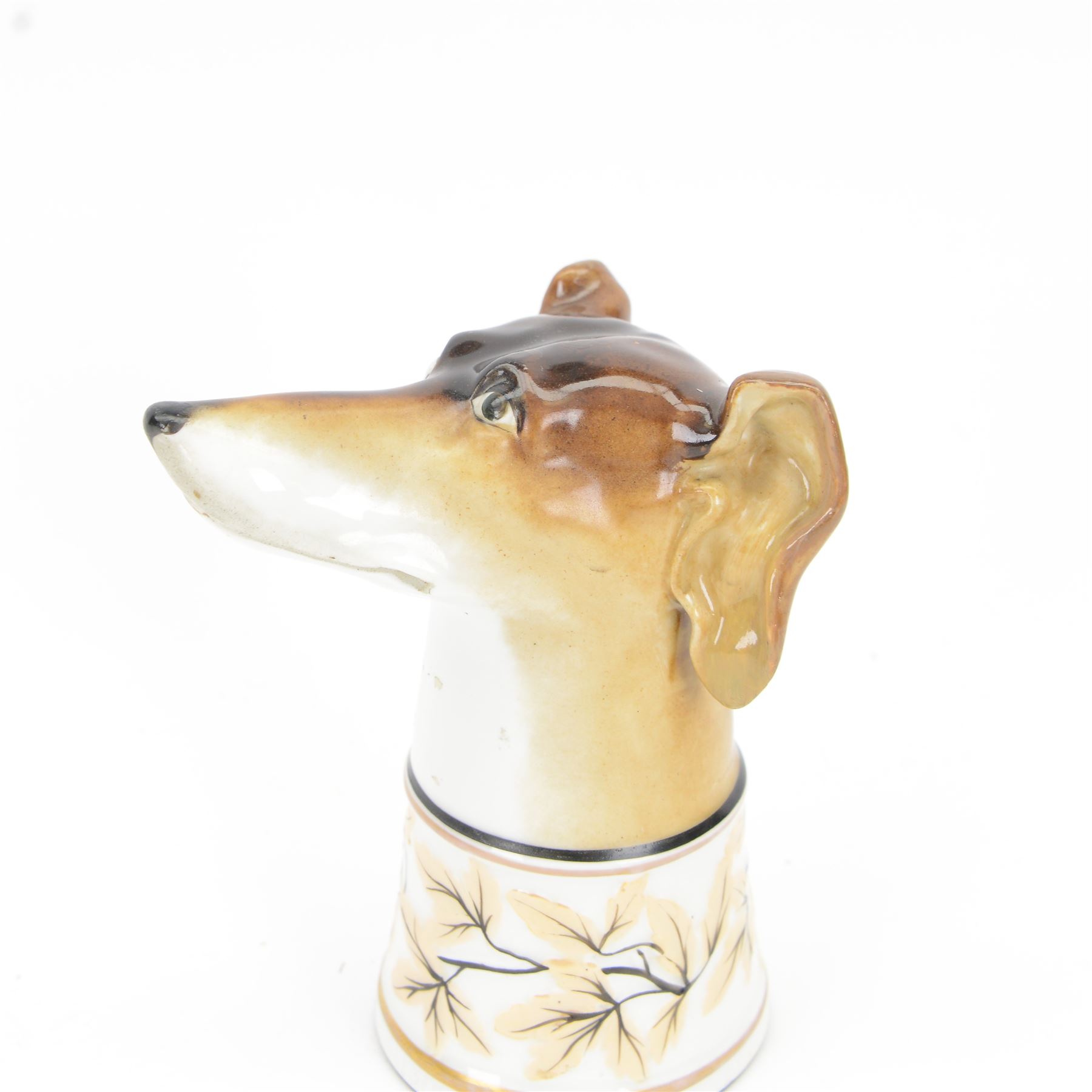 Late 19th century Continental porcelain stirrup cup, modelled as a hounds head, with wide collar detailed with lustre vines, H14.5cm