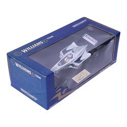 Three signed limited edition 1:18 scale Formula One models, comprising Hot Wheels Jordan EJ12 signed by Takuma Sato, Hot Wheels Jaguar Racing R2 signed by Eddie Irvine and a Minichamps Williams F1 Team model signed by Jenson Button, 1:18 scale model, all boxed