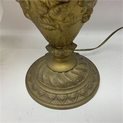Gilt metal table lamp, heavily embossed with flowers and butterflies, with fluted frosted glass shade, H56cm