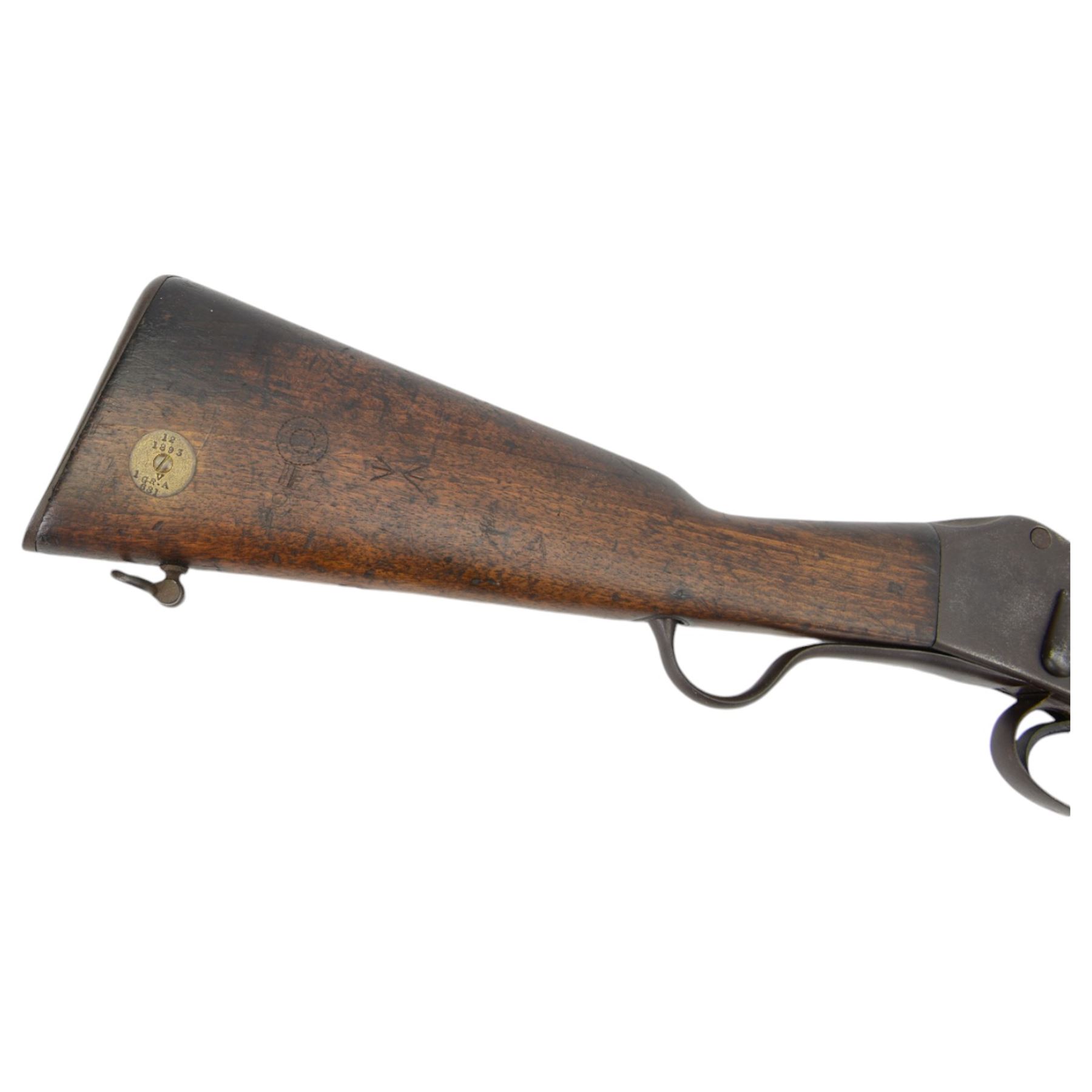 Martini-Henry MKII/2 Carbine, the 52cm round barrel with various inspectors marks,   fitted with ladder sight, with various inspector's marks, the action marked Enfield, the walnut full stock with two steel barrel bands, the butt inset with brass roundel stamped' 12 1893 V 1 GR. A 6', and with Sold Out of Service arrows to the butt, action and barrel, steel cleaning rod beneath, overall 96cm
Sold as an exempt item under Section 58 (2) of the 1968 Firearms Act, to be held as a curiosity or ornament


