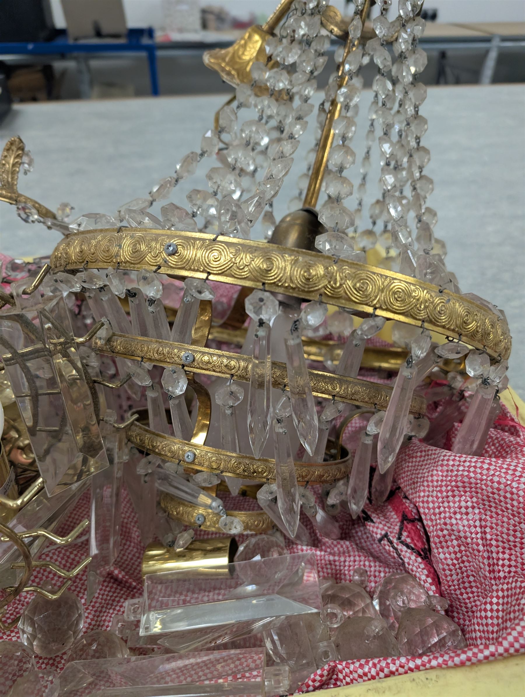 Four brass and glass chandelier light fittings