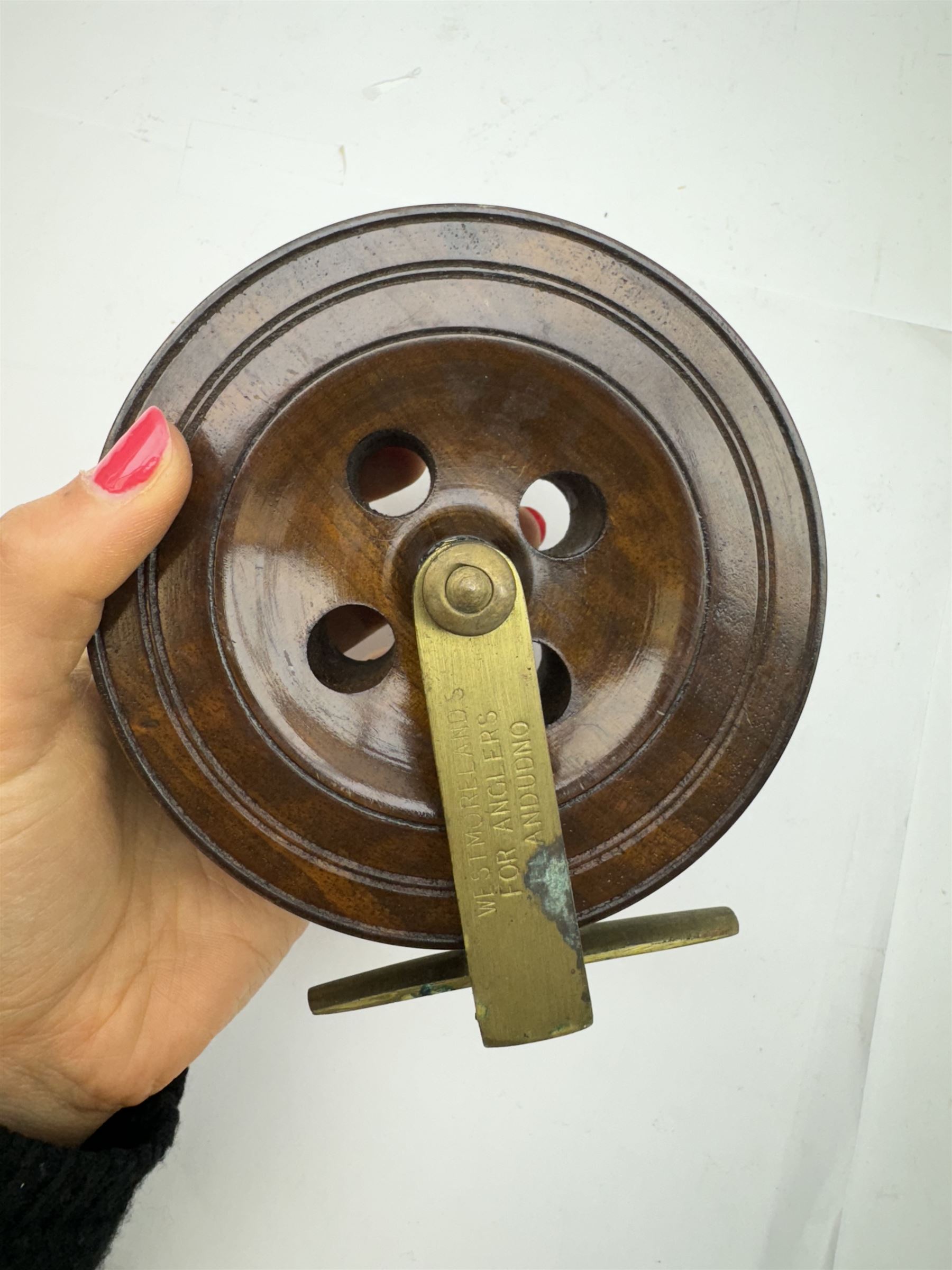 D. Slater, Newark, wood, alloy and brass star-back centre pin reel,  together with three other wooden/alloy reels including Edge Elite, Milbro Pelican and one other 