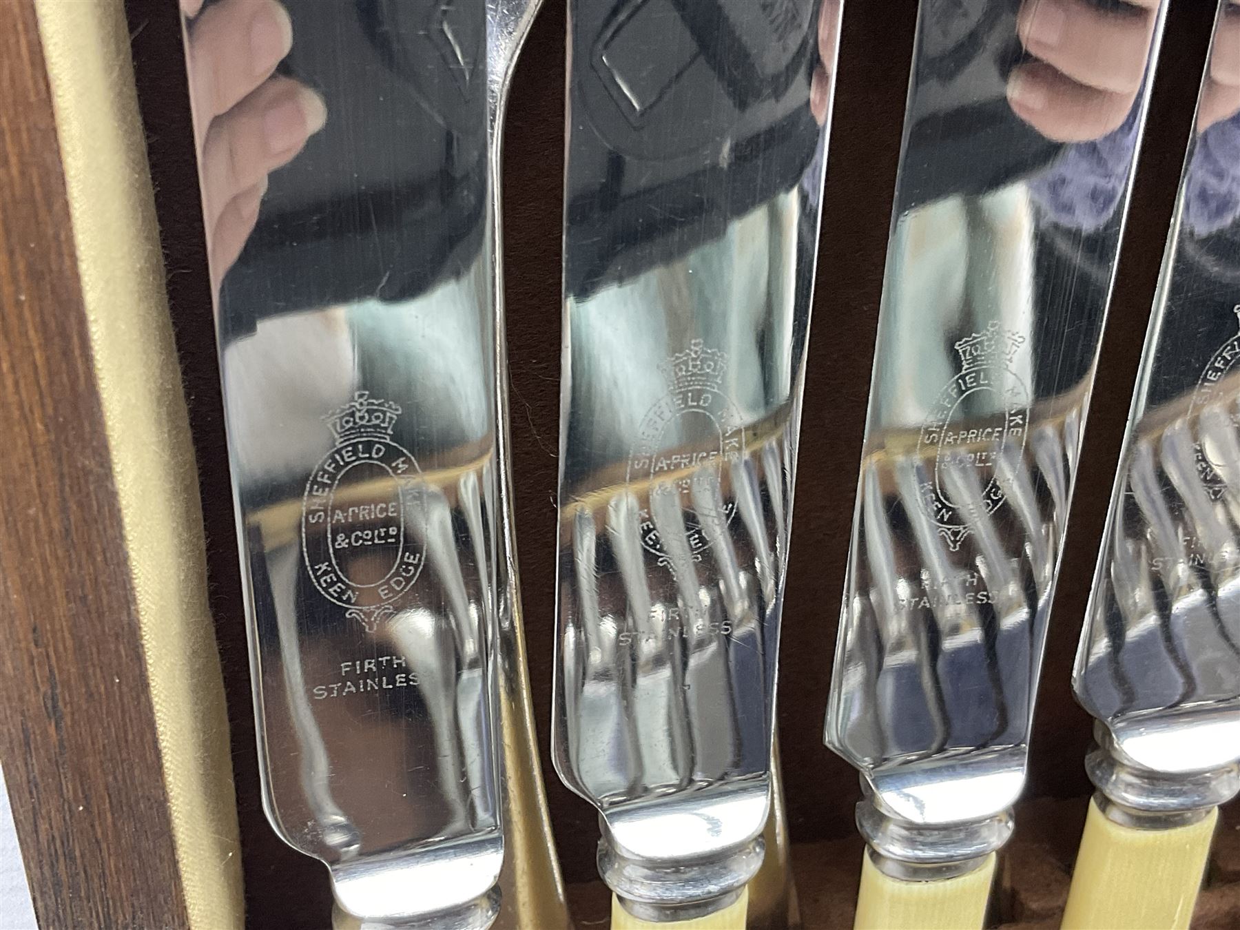 Twelve place setting canteen of cutlery by Lee & Wigfull Ltd, cased in an oak  chest, with key, meat carvers are missing, H18cm, L44cm 