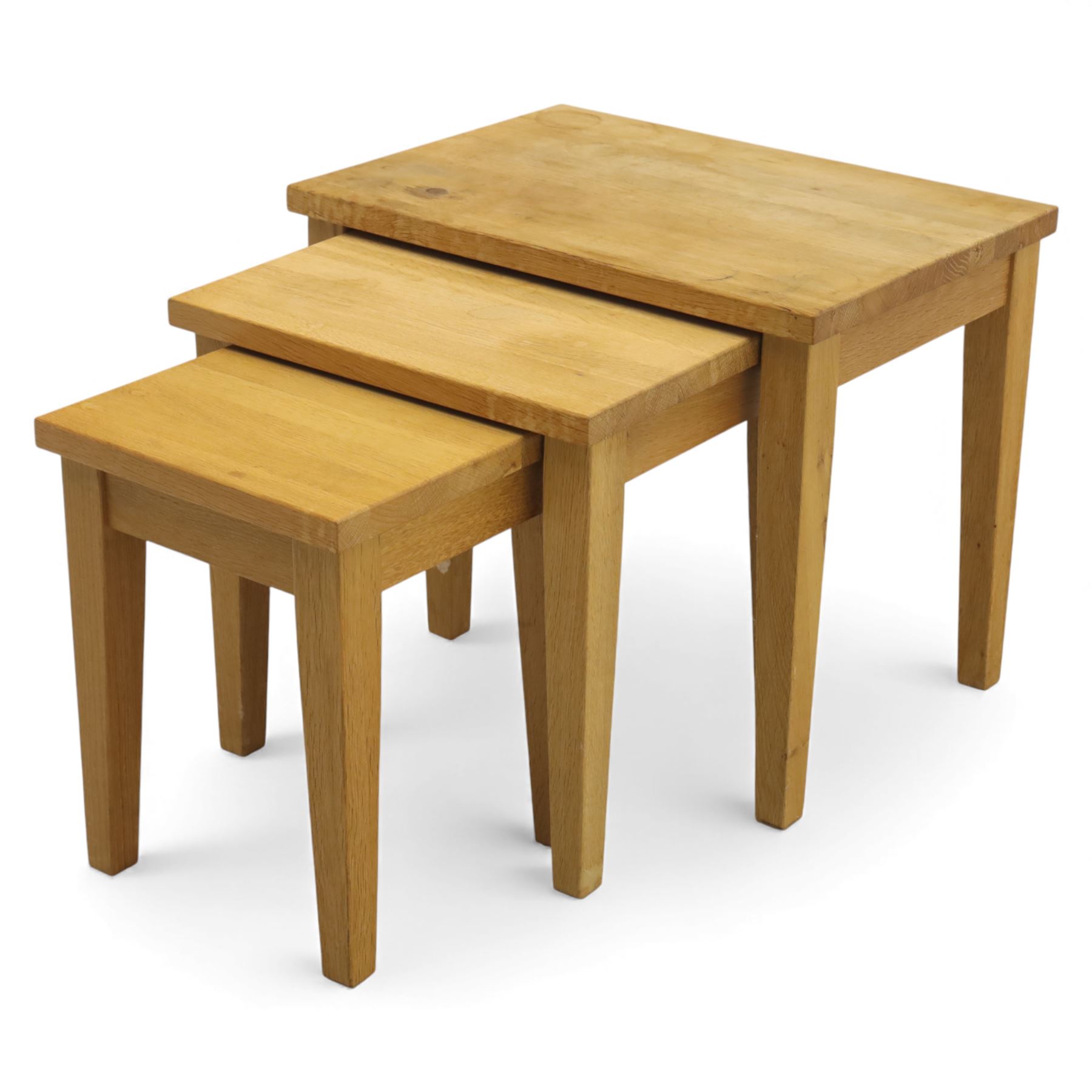 Modern solid oak nest of three tables, each with straight-edged rectangular top and square legs