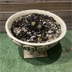 Pair of large decorated cast stone planters on plinths  - THIS LOT IS TO BE COLLECTED BY APPOINTMENT FROM DUGGLEBY STORAGE, GREAT HILL, EASTFIELD, SCARBOROUGH, YO11 3TX