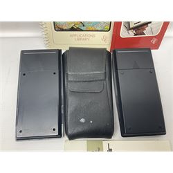 Four 1970s Sinclair electronic calculators - Cambridge in hard case with booklet; Scientific Programmable with Program Library and booklet; Scientific in hard case; and Oxford 300 in soft case with booklet; together with Texas PC-100 SR56 programmable slide-rule calculator on base station with readout, two booklets, keys and cover, serial no.9103093