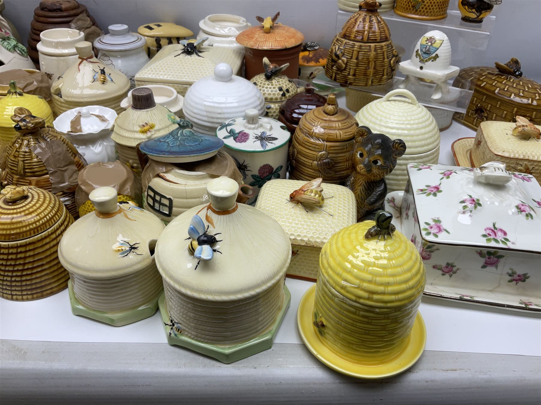 Large collection of honey pots, of various shapes, to include examples from Crown Devon, Marutomo ware, W.H Gloss, Goebel etc 