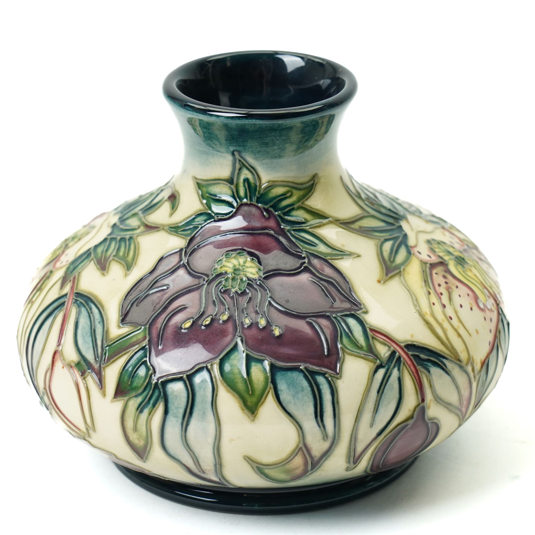 Moorcroft Hellebore pattern vase, of squat baluster form, with impressed and painted marks to base, in original box, H10.5cm 